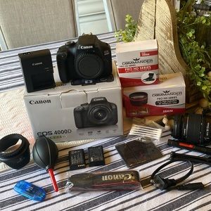 NIB EOS Canon 4000D camera kit. Includes an xtra lens and 3pc digital filter kit